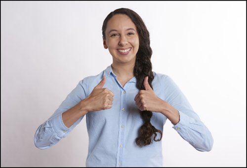 Woman with two thumbs up positive reaction