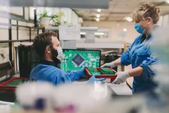 technicians working under covid-19 guidelines