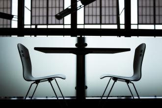 two chairs around a table