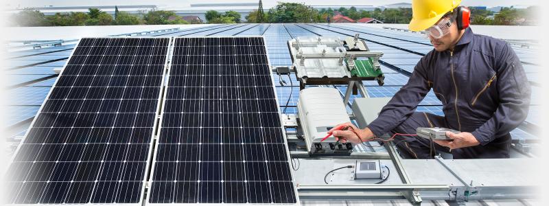 Solar tech repairing solar panel