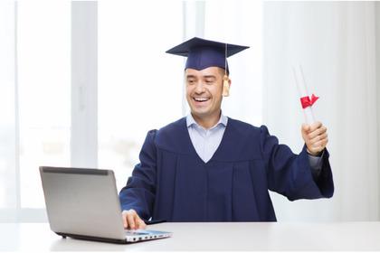 Graduating student with cap and gown