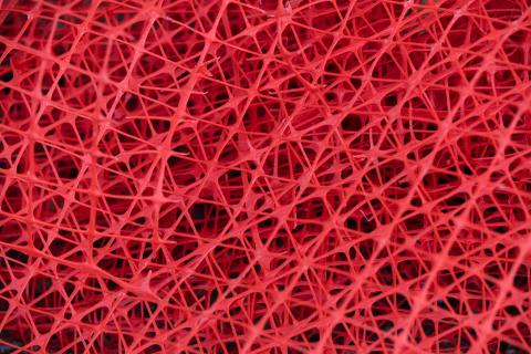 red plastic toy by jon-moore-tIgJR__pjZw-unsplash