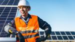 Solar Tech in front of Solar Panels